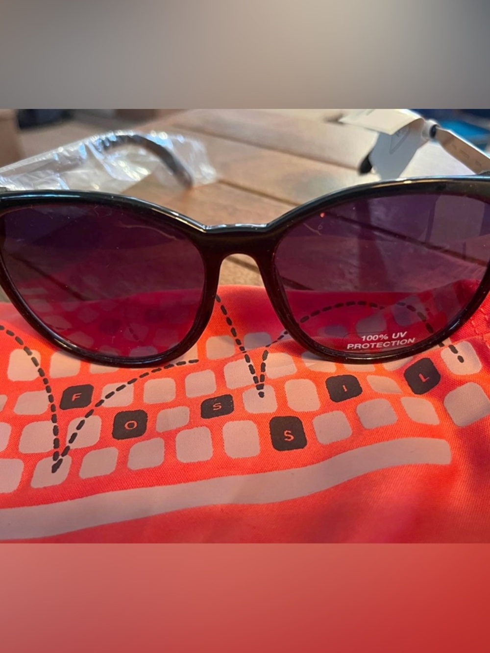 Fossil Semi Cat-Eye Sunglasses with Black & Silver Frame. 100% UV Protection